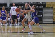 (Photo/Alex Kielar) LaKyla Bartley looks to shoot in the paint against a Gorman defender in the Lady Bucks’ first game of the Holiday Ford Classic Thursday, Nov. 13 at Gordon High School. 