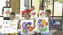 Art students show off their work during the Kids and Art Camp. In front, l-r, are Gabryel Moore and Mara and Aurrin Matheson. In back are: Leslie Abbott, Pretin and Providence Ezell and Taylor Champion.
