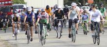 Members of the Everett family and friends take off  at the starting line near Miller Park Saturday.