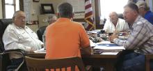 Certified Public Accountant Cameron Gulley fields questions from Stephens County commissioners.