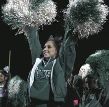 Breckenridge High School senior Kelli Wilcox cheers during the Ponder/Breckenridge football game.