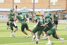 The Buckaroos (shown Saturday, Aug. 10 at the watermelon scrimmage) will raise money this week for the Texas High School Coaches Education Foundation’s benevolence fund during their scrimmage Thursday against Wall. Archive photo