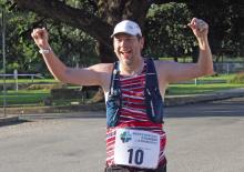 Scott Kirkowski crossing the finish line of the Breckenridge Chamber of Commerce 10k which served as a Boomfest fundraiser. Photo/Alex Kielar