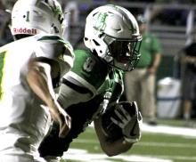 Senior running back Terrance Roberson gets past a defender for a touchdown.