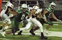 Senior defensive end Terrance Roberson tracks down a runner in the backfield.