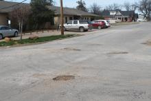 Pictured here are potholes around the Hospital off South Hartford Street. BA photo by James Norman