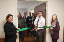 Stephens County Memorial Hospital CEO Matt Kempton cuts the ribbon to open the new nuclear lab facility. BA photo by James Norman
