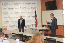 Texas Rep. Mike Lang (left) and Texas Sen. Charles Perry (right) talk with residents and officials about the issues in the state. The town hall featured discussion on several issues. BA photo by James Norman