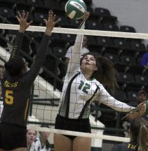 Breckenridge middle hitter Calista Lambert makes a kill.