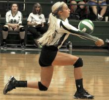 Senior outside hitter Kelli Wilcox gets under a serve.