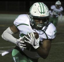 Breckenridge senior receiver Riley Durham breaks away for a touchdown in the third quarter of Friday night's game against Boyd.