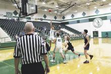 Joseph Juneau (3) scored a combined 18 points last week in a pair of losses to TLCA and Huckabay. The Bucks were defeated 66-33 Tuesday, Dec. 12 by TLCA and 72-52 Friday, Dec. 15 by Huckabay. Photo/Mike Williams