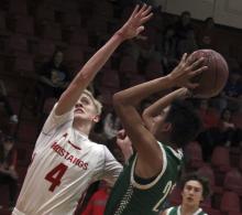 Aaryn Medina hits a fade-away jumper against Sweetwater Saturday.
