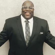 Shown here is new K-Lakes sports director "Dee" Wright.