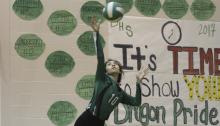 Maria Alvarado hits five consecutive aces during Saturday's four-set victory.